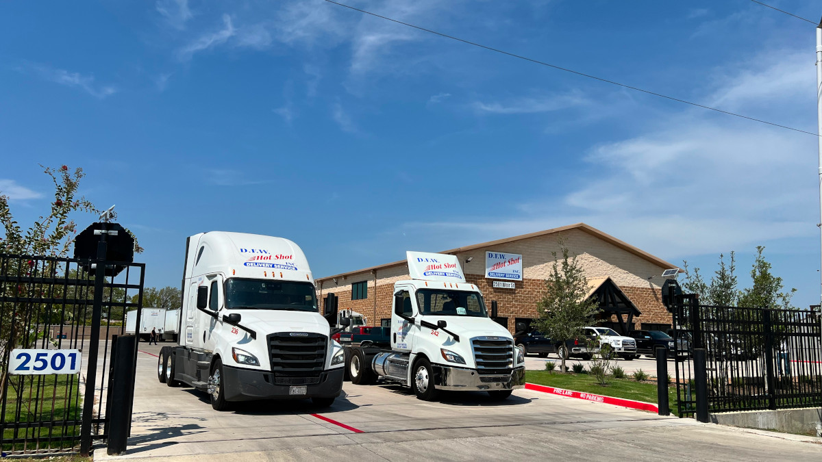 Two Trucks at Office Entrance